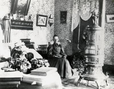 Unidentified woman in a reading room